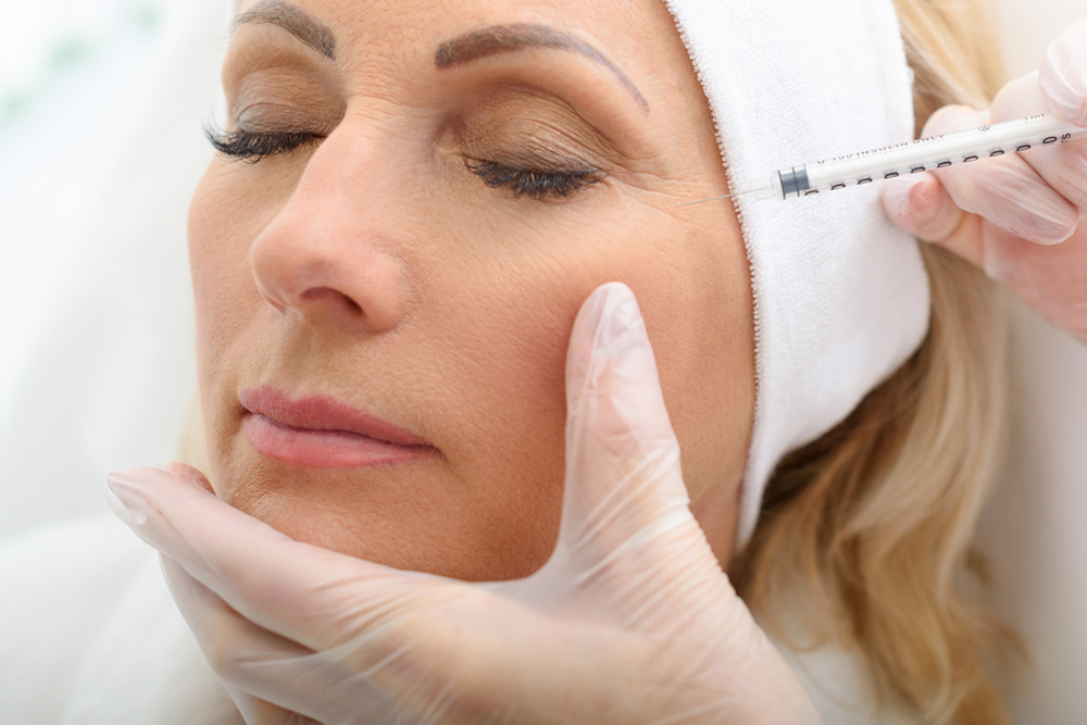 Senior lady getting a Botox injection