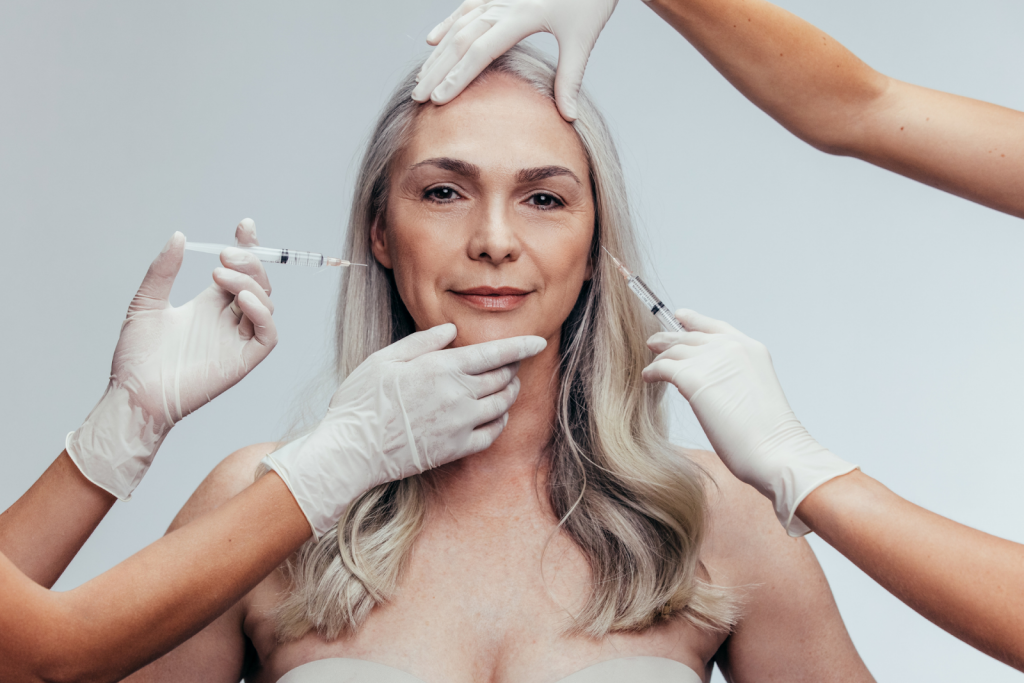 A woman receives Botox injections