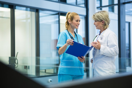 Female nurse and doctor.