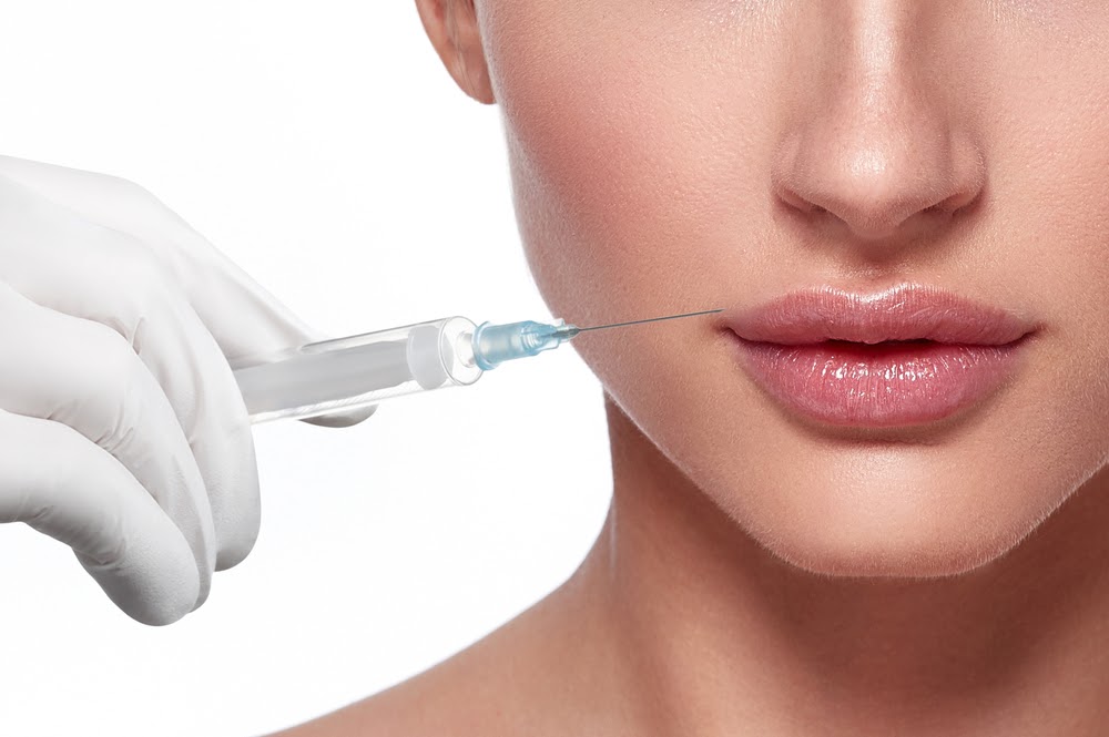 Woman getting a cosmetic injection treatment