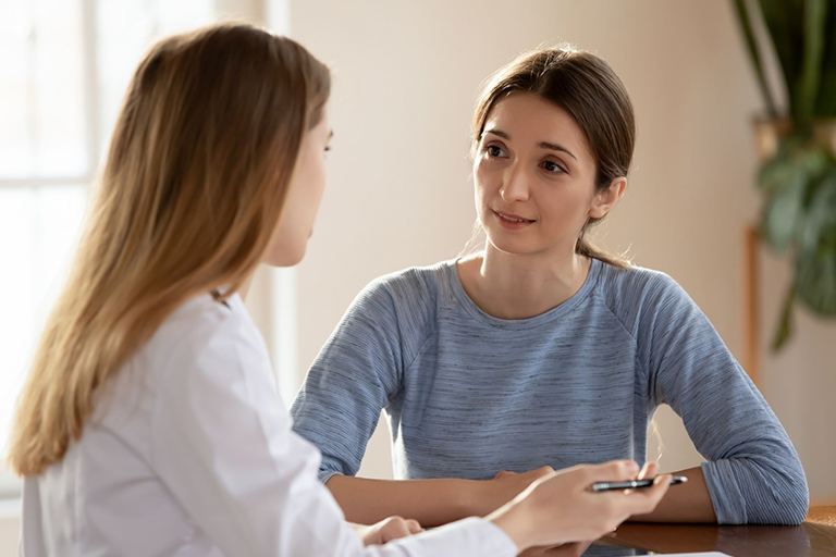 A patient consulting with a medical aesthetics professional