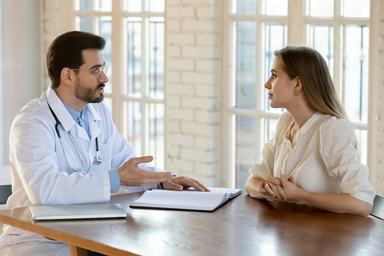 A doctor offering advice to a patient