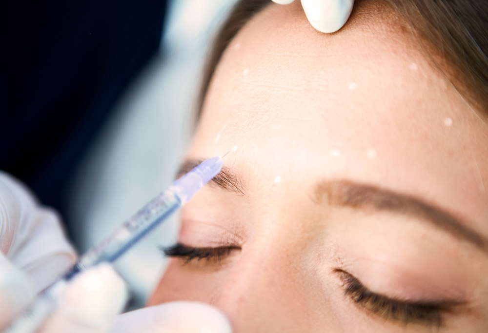 A young woman getting Baby Botox