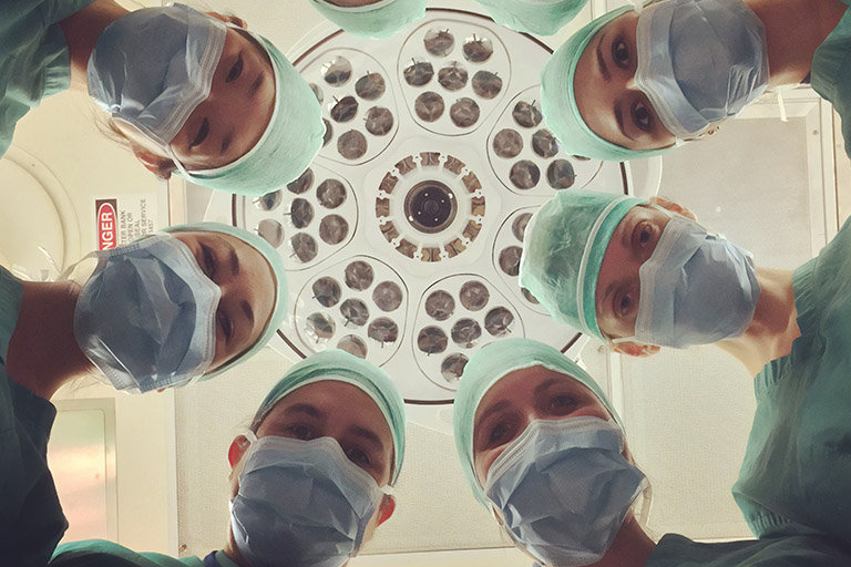 A racially-diverse group of medical professionals