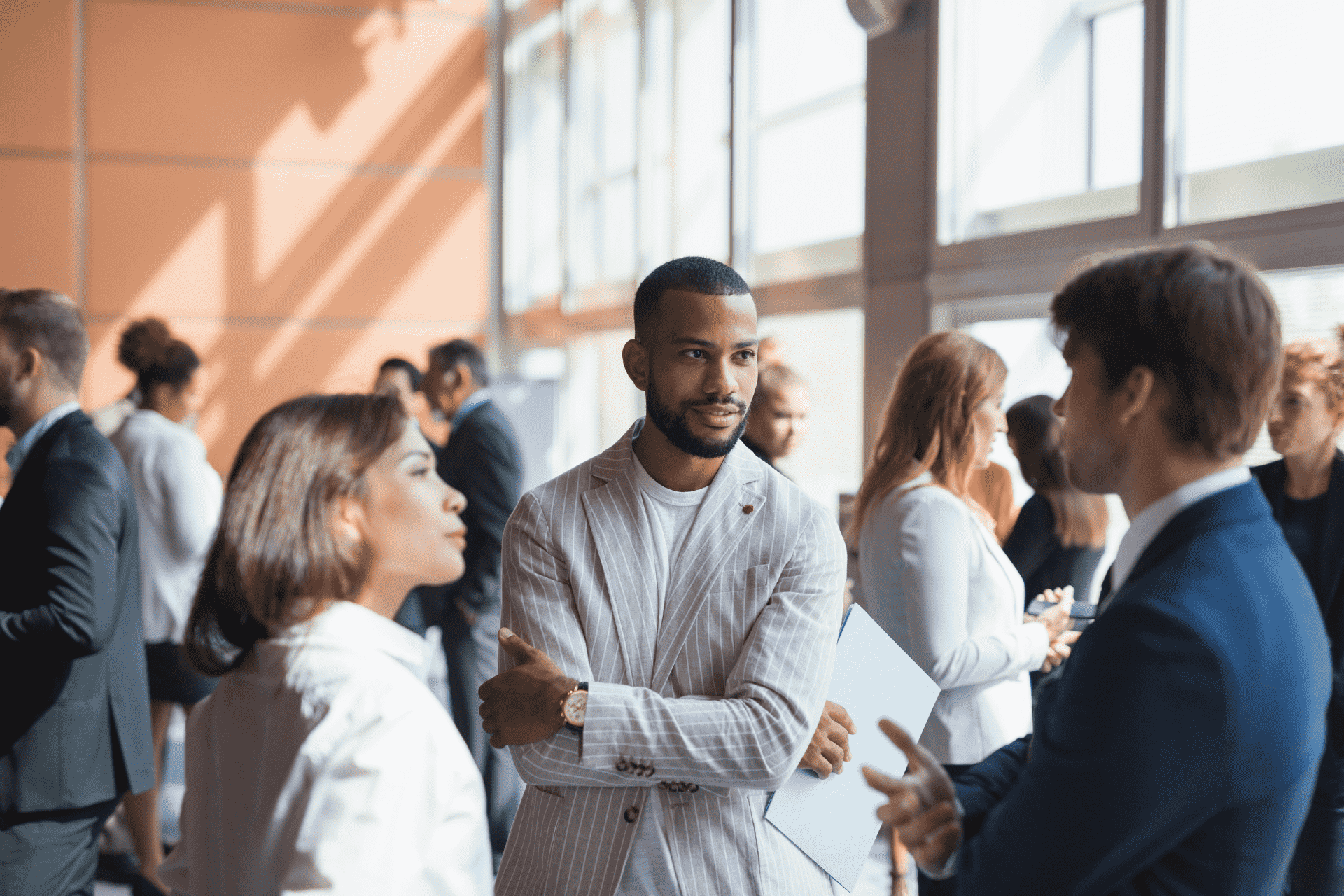 a group of medical professionals discussing the conference material
