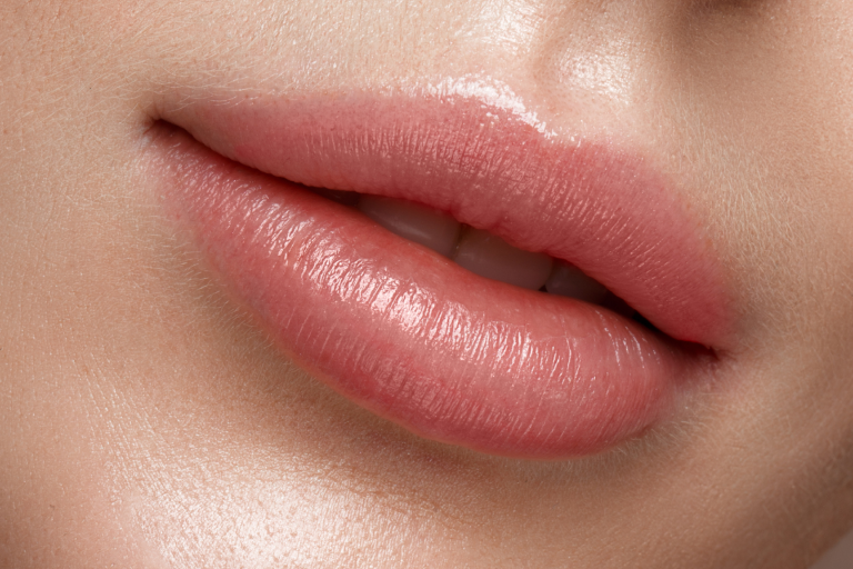 A close-up of subtle, upturned lips