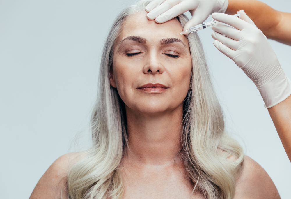 A botox model receiving an injection