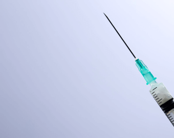 A close-up of a needle with filler